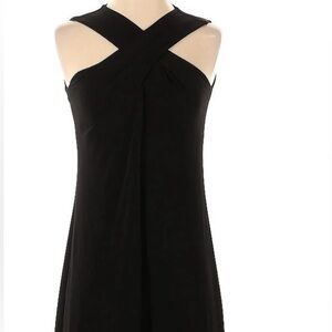 Michael Kor’s crisscross clack dress. Size Small. Zippered back.